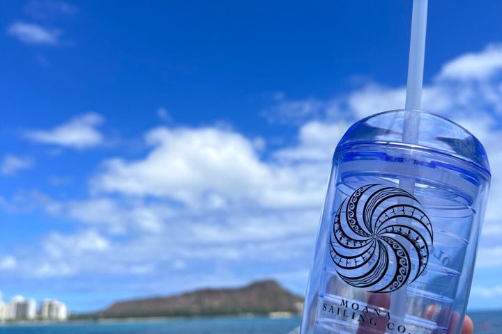 a man holding a glass of water
